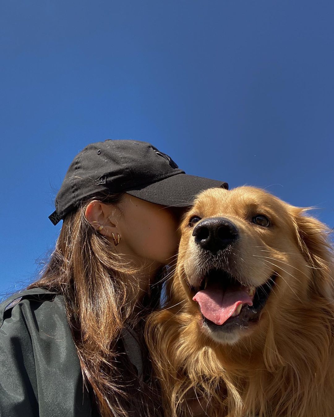 Woman and golden retriever